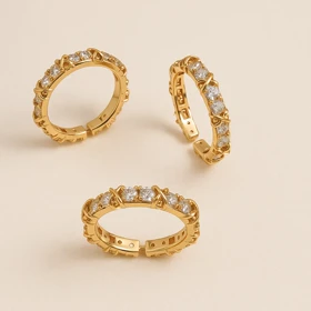 انگشتر فری سایز ژوپینگ طلایی با نگینهای درشت و قاب حصیری