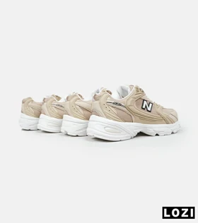کفش کتانی مردانه و زنانه کرم سفید NEW BALANCE 530