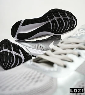 کفش کتانی زنانه و مردانه طوسی Nike guide 10
