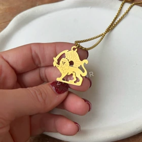 گوشواره و گردنبند طرح شیر و خورشید برگرفته از نماد تاریخی