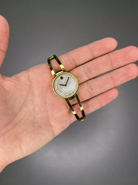 ساعت مچی موادو بند النگویی طلایی صفحه صدفی Movado
