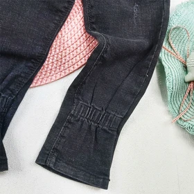 شلوار جین زغالی دخترانه استیکر 5 سال