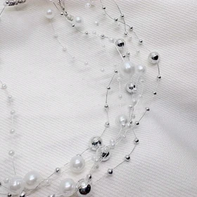 گردنبند نامرئی طرح «مروارید معلق» (Illusion Necklace) | مینیمال و اقتصادی