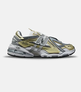 کفش کتانی مردانه و زنانه سفید طوسی طلایی New Balance 1906R مدل 9018