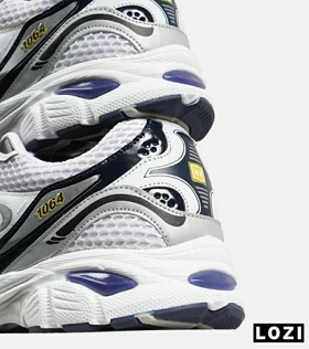 کفش کتانی مردانه و زنانه سفید سرمه ای NEW BALANCE 1064 V.2