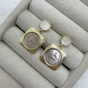 گوشواره طرح سکه یک ریالی قدیمی