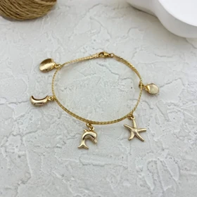 دستبند زنانه ژوپینگ طرح کارتیه با آویز دریایی و صدف