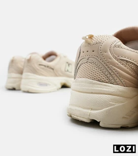 کفش کتانی مردانه و زنانه کرم NEW BALANCE 530