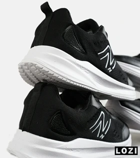 کفش کتانی مردانه و زنانه مشکی سفید NEW BALANCE 860