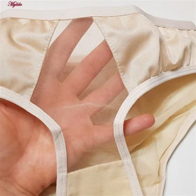 ست شورت و سوتین ساتن زنانه پانیذ مدل فنردار کرم کد 4649