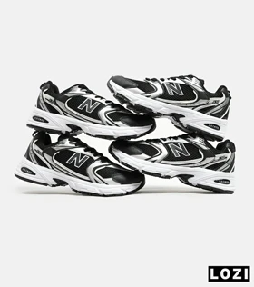 کفش کتانی مردانه و زنانه مشکی نقره ای NEW BALANCE 530