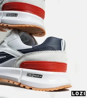 کفش کتانی سفید سرمه ای REEBOK Unphased Pro