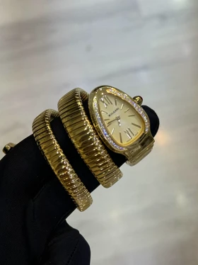 ساعت زنانه ماری بولگاری طلایی دور نگین