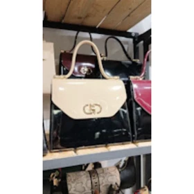 کیف مجلسی زنانه برند کریستین دیور Christian Dior مشکی ورنی براق (مشکی با سرخانه کرم)