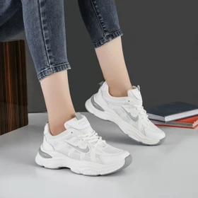 کفش و کتانی زنانه مدل نایک NIKE رنگ سفید طوسی