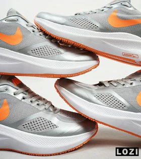 کفش کتانی مردانه طوسی نارنجی Nike guide 10
