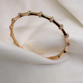 بنگل ژوپینگ مدل «بامبو» (Bamboo) | ساقه‌های طلایی با گره‌های نگین‌دار