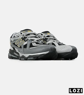 کفش کتانی مردانه و زنانه طوسی مشکی New Balance 1906R مدل 7547