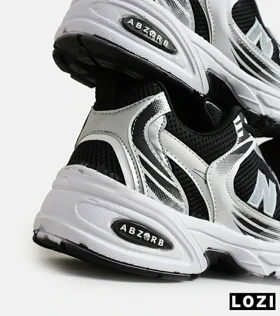کفش کتانی مردانه و زنانه مشکی سفید NEW BALANCE 530 مدل 5636
