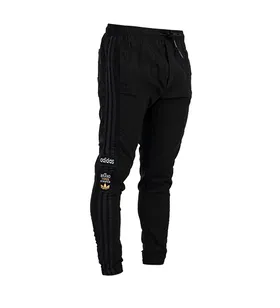 شلوار اسلش خط‌دار مردانه Adidas