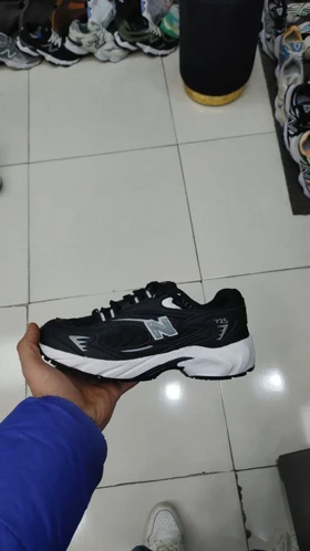 کفش کتانی نیوبالانس مشکی new balance 725