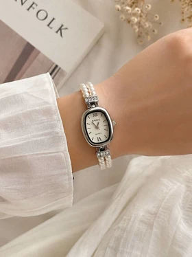 ساعت مچی زنانه نایدو بند مرواریدی استیل کد W516 (سفید)