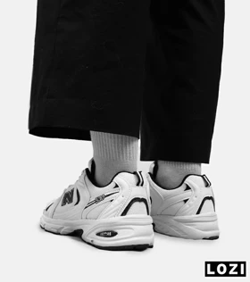 کفش کتانی مردانه و زنانه سفید مشکی NEW BALANCE 530