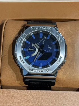 ساعت جی شاک2100 بند برزنتی مشکی صفحه طرحدار