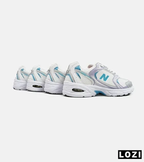 کفش کتانی مردانه و زنانه سفید آبی یاسی NEW BALANCE 530 مدل 5445