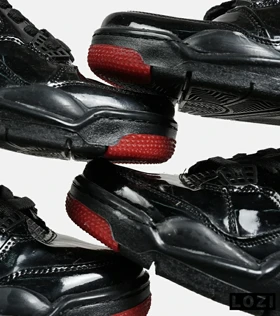 کتانی ساق‌دار زنانه و مردانه مشکی ورنی Nike air jordan 4