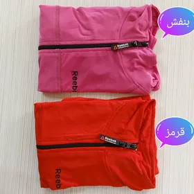 بلوز نیم زیپ آستین شصتی ریبوک زنانه