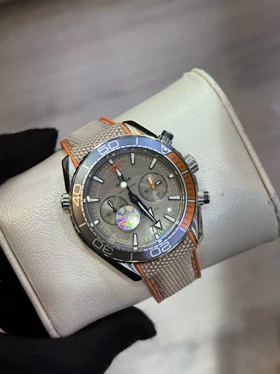 ساعت مردانه امگا سیمستر سه موتوره طوسی نارنجی