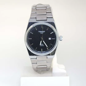 ساعت مچی مردانه تیسوت Tissot 1853 PRX تاریخ دار با ماندگاری رنگ بالا (نقره ای با صفحه مشکی)