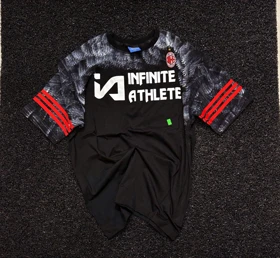 تیشرت کیت باشگاهی آث میلان طرح پیسوله ای رنگ مشکی