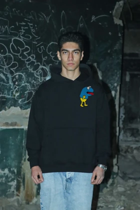 هودی مشکی اسپرت مینیمال طرح آدمک زرد و آبی - فواصل