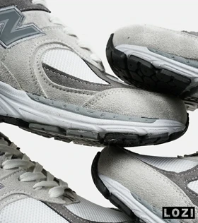 کفش کتانی طوسی خاکستری NEW BALANCE 2002R