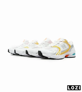 کفش کتانی زنانه صورتی زرد NEW BALANCE 530