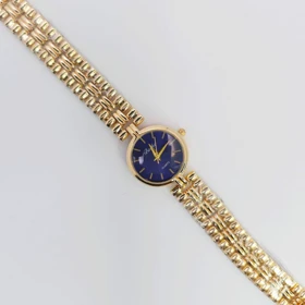 ساعت مچی زنانه باوک Baoke نگین‌دار با موتور کوارتز (بند طلایی صفحه سورمه ای)