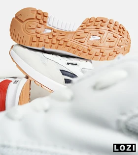 کفش کتانی سفید سرمه ای REEBOK Unphased Pro