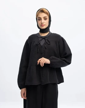 جلو دکمه پارچه چروک