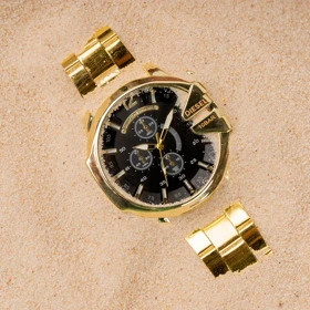 ساعت مچی DIESEL مردانه طلایی صفحه مشکی مدل U700 ویژه