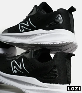 کفش کتانی مردانه و زنانه مشکی سفید NEW BALANCE 860
