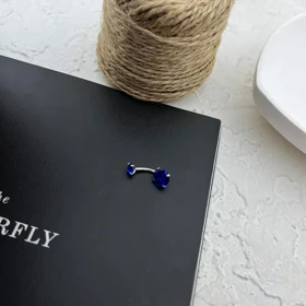 پیرسینگ ناف نگین‌دار استیل با جلوه زنانه