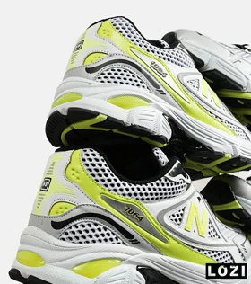 کفش کتانی مردانه و زنانه سفید لیمویی NEW BALANCE 1064 V.2