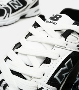 کفش کتانی مردانه و زنانه سفید مشکی NEW BALANCE 530