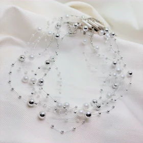 گردنبند نامرئی طرح «مروارید معلق» (Illusion Necklace) | مینیمال و اقتصادی