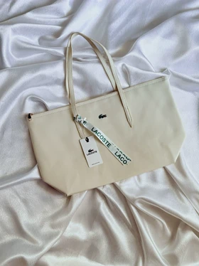 کیف لاگوست اسپرت کد 3890 (کرم استخونی)