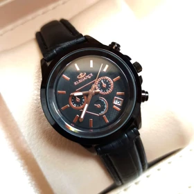 ساعت چرمی زنانه الگانس طرح سه موتور تقویم دار بند مشکی