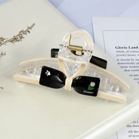 کلیپس مو زنانه مدل اکریلیک پاپیونی کد G_L_1492