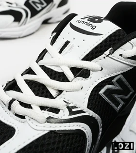 کفش کتانی بزرگ پا سفید مشکی NEW BALANCE 530